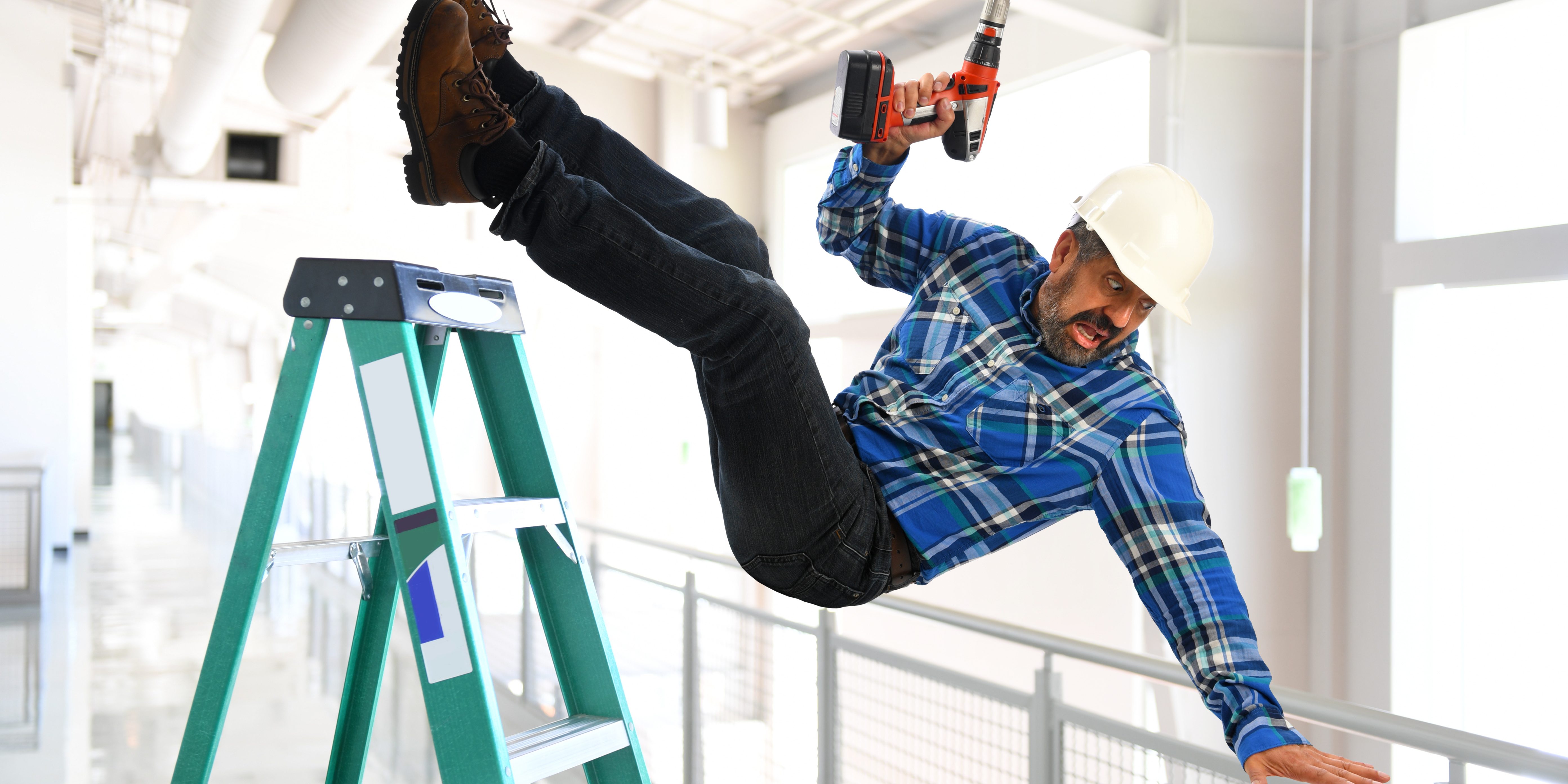 Hispanic worker falling from ladder inside building